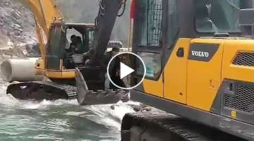 Dangerous excavator bucket ride to cross the river