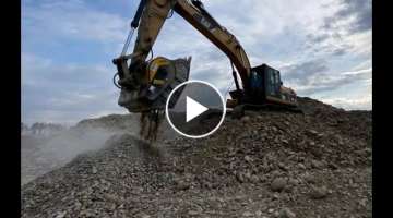 Crushing river rocks using an excavator