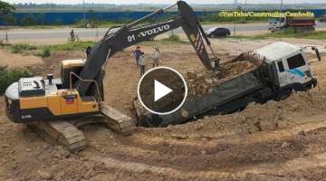 Heavy Dump Truck Stuck In Deep Hole & Recovery By Excavator, Bulldozer