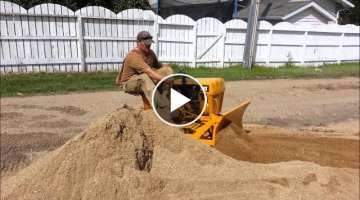 CAT Mini Dozer Pushing Dirt