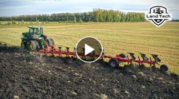 The tractor plows itself! Tracked John Deere 9460RT and Gregoire Besson 11-furrow reversible plow...