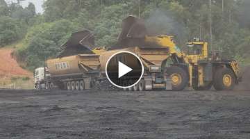 Double vessel loading process in coal mining